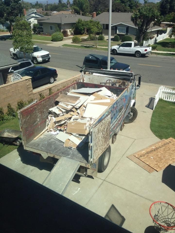 All Haul truck bed loaded with debris, viewed from above