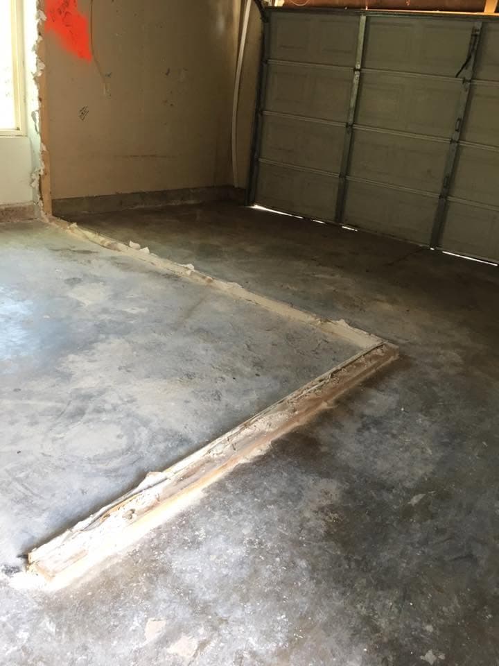 Empty garage floor after the cleanout